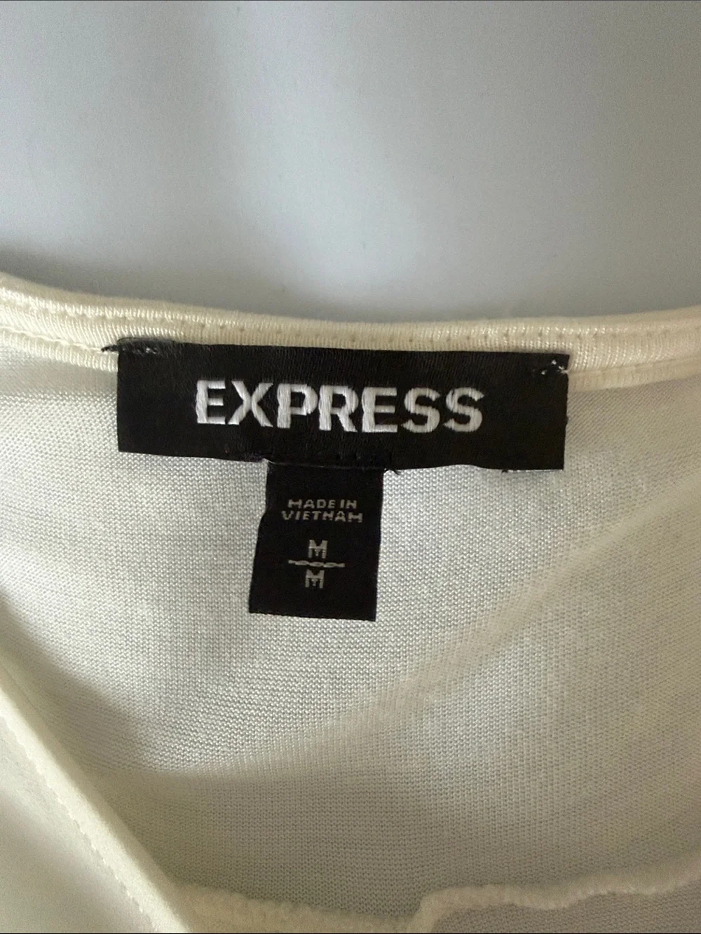 Express Cream V-Neck Sleeveless Top - Picture 2 of 3